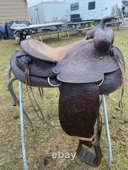 Used /vintage 15 tooled round skirt Western saddle for round withers US made