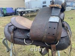 Used /vintage 15 tooled round skirt Western saddle for round withers US made