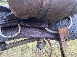 Used /vintage 15 tooled round skirt Western saddle for round withers US made