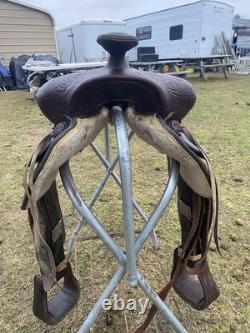 Used /vintage 15 tooled round skirt Western saddle for round withers US made