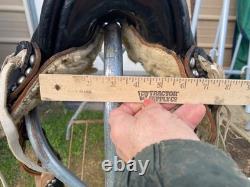 Used/vintage/antique 12 studded leather western pony saddle withwhite strings
