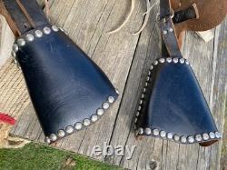 Used/vintage/antique 12 studded leather western pony saddle withwhite strings