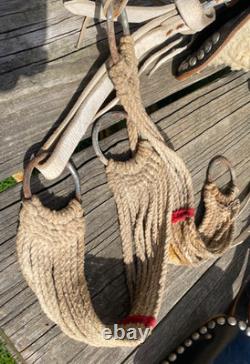 Used/vintage/antique 12 studded leather western pony saddle withwhite strings