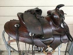Used/vintage/antique hard seat Western saddle withfree swinging fenders US made