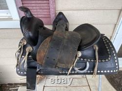Vintage/Antique 15.5 Simco Western saddle withsilver diamonds, tapaderos