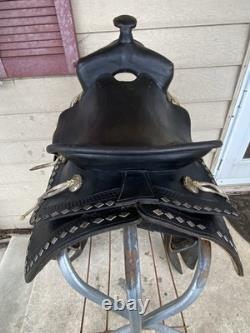 Vintage/Antique 15.5 Simco Western saddle withsilver diamonds, tapaderos