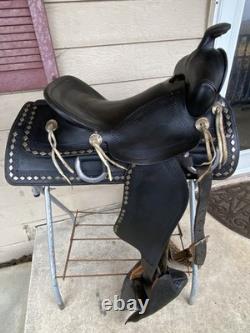 Vintage/Antique 15.5 Simco Western saddle withsilver diamonds, tapaderos