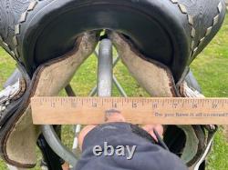Vintage/used 15.5 Western parade saddle withsilver diamonds, red seat