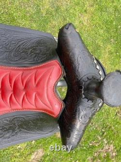 Vintage/used 15.5 Western parade saddle withsilver diamonds, red seat
