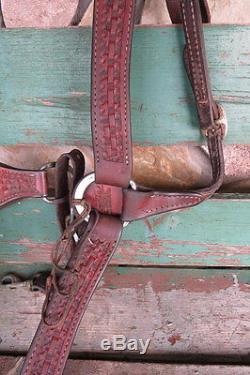 Vinton Western Cutter Saddle with rough out seat and fender. Basketweave design
