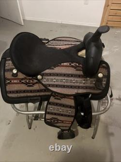 Western Saddle Never Used and Comes with Saddle Stand Made In USA